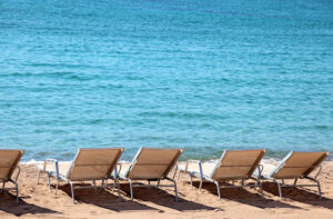 Beachfront with beachchairs at Cannes, France